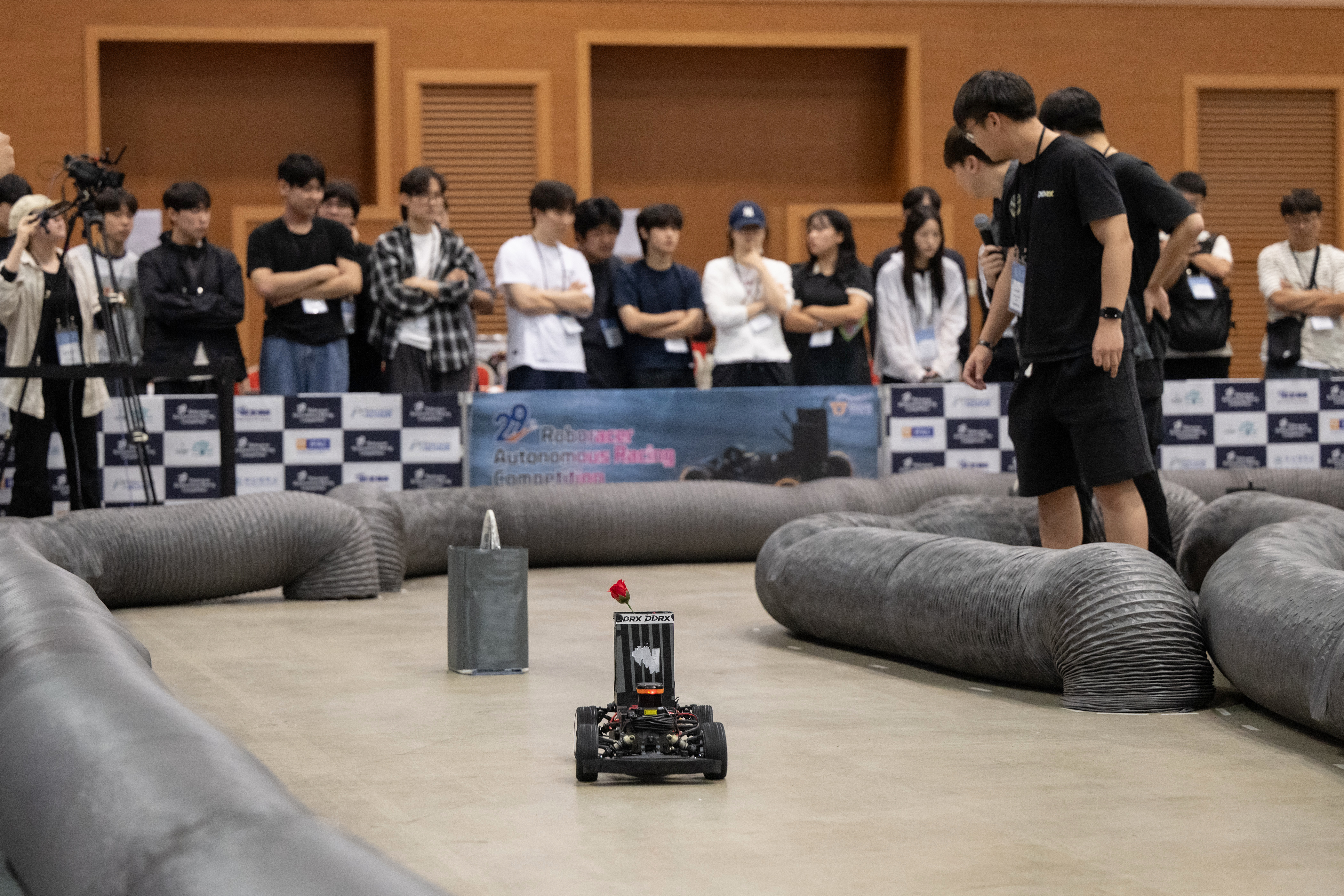 DDRX autonomous race car on the IFAC 2026 RoboRacer track